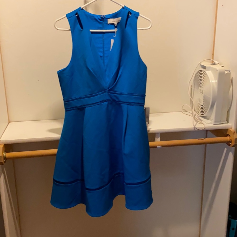 Royal blue lined sleeveless, above the knee length